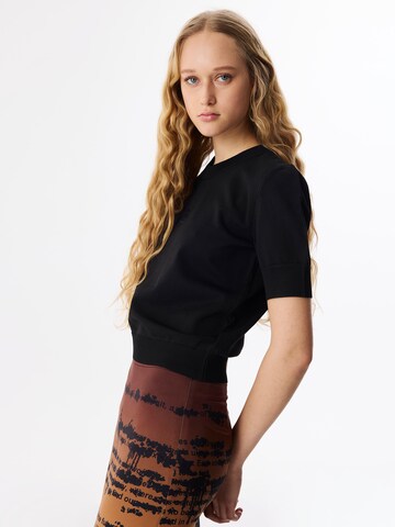 Pull-over Twist en noir