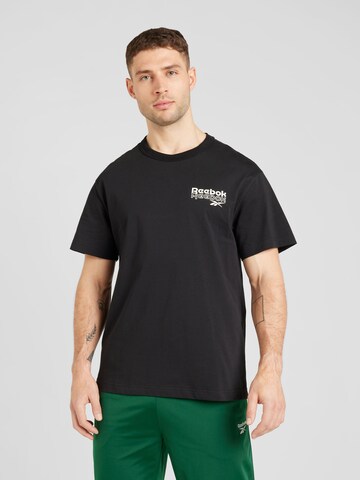 Reebok Shirt 'PROUD' in Schwarz