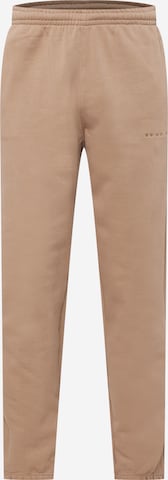 ADIDAS ORIGINALS Tapered Pants 'Reveal Essentials' in Brown: front