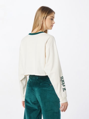 balta LEVI'S ® Marškinėliai 'Graphic LS Crop Reese'