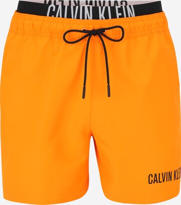 Calvin Klein Swimwear Board Shorts in Orange: front