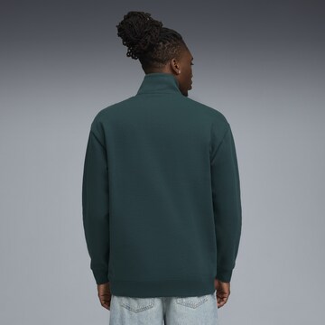 PUMA Sweatshirt 'Class' in Grün
