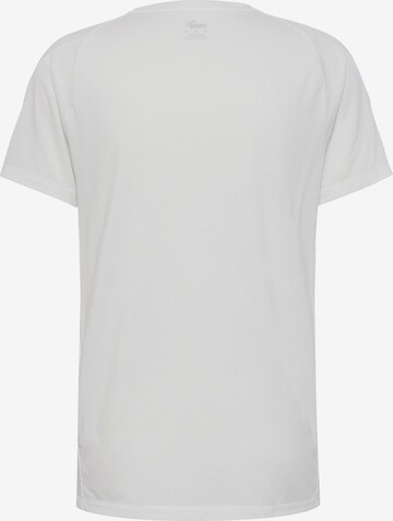 T-Shirt fonctionnel 'Evostripe' PUMA en blanc