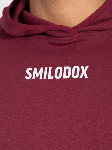 Sweat-shirt 'Maison' Smilodox en rouge