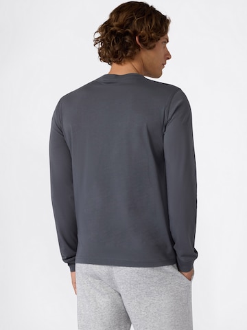 Maglietta di Champion Authentic Athletic Apparel in grigio
