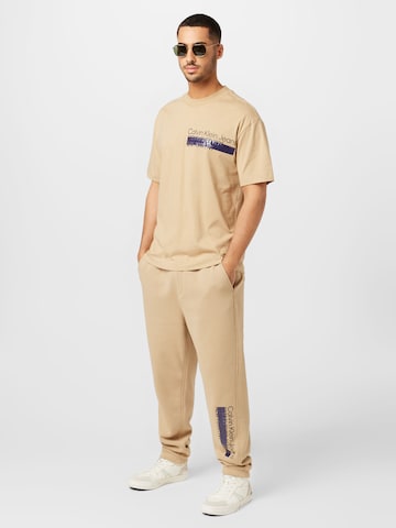 Calvin Klein Jeans Alt kitsenev Püksid, värv beež