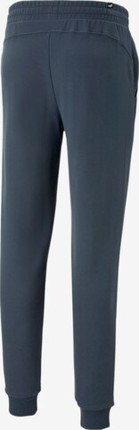 Effilé Pantalon de sport PUMA en bleu