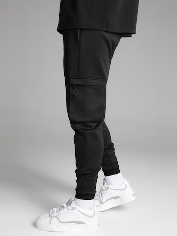 Tapered Pantaloni di SikSilk in nero