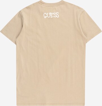 GUESS قميص بلون بيج