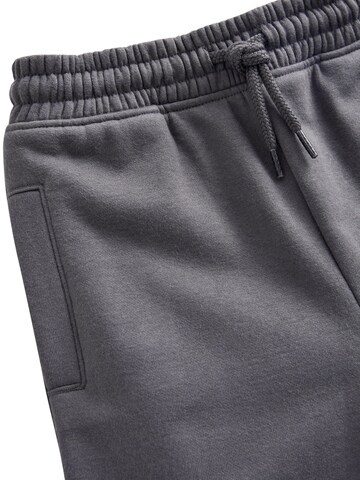 Skinny Pantaloni di Next in grigio