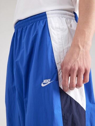 Nike Sportswear Tapered Nadrág 'CLUB' - kék