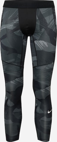 Skinny Pantalon de sport NIKE en noir : devant