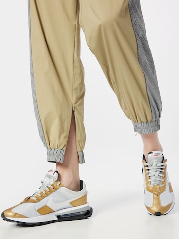 LACOSTE Tapered Workout Pants in Beige