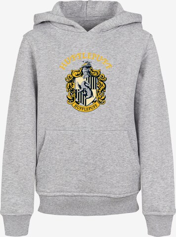 F4NT4STIC Sweatshirt 'Harry Potter Hufflepuff Crest' in Grau: predná strana