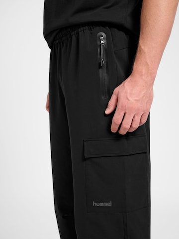 Loosefit Pantalon de sport Hummel en noir