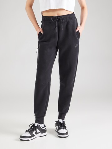 Nike Sportswear Zwężany krój Spodnie w kolorze czarny: przód