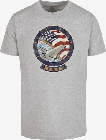 Merchcode T-Shirt 'NASA - Faded' in Grau: predná strana