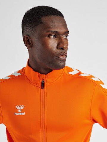 Hummel Sportsweatjacka 'POLY' i orange