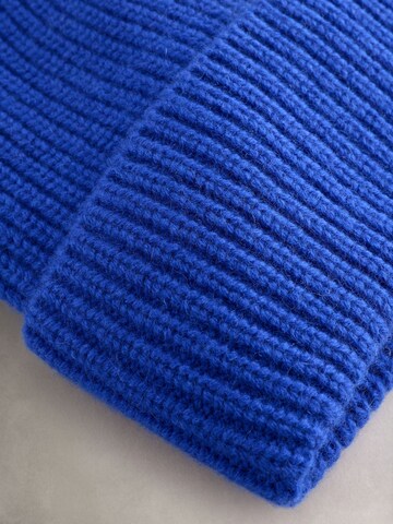 Bonnet Next en bleu