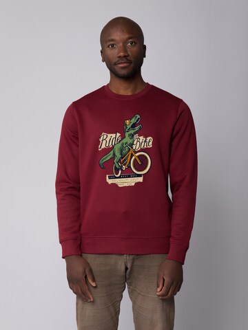Felpa ' T-Rex Fahrrad ' di Watapparel in rosso: frontale