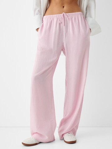 Bershka Szeroka nogawka Spodnie w kolorze różowy: przód