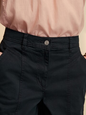 Loosefit Pantaloni chino di Next in nero