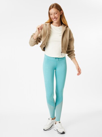 Skinny Pantalon de sport PUMA en beige