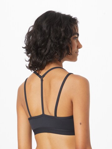 ADIDAS SPORTSWEAR Bustier Urheilurintaliivit 'Essentials Light-Support' värissä musta