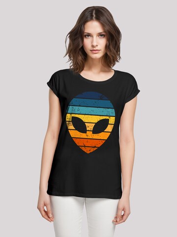T-shirt 'Alien Sonnenuntergang Retro' F4NT4STIC en noir : devant
