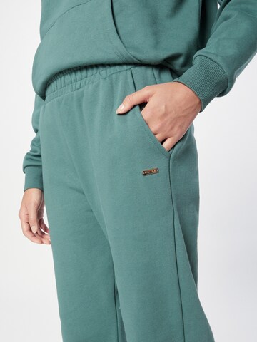 Athlecia Tapered Workout Pants 'Cinzia' in Green