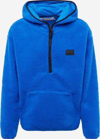 Sweat-shirt Calvin Klein Jeans en bleu : devant