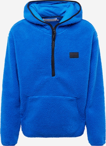 Sweat-shirt Calvin Klein Jeans en bleu : devant