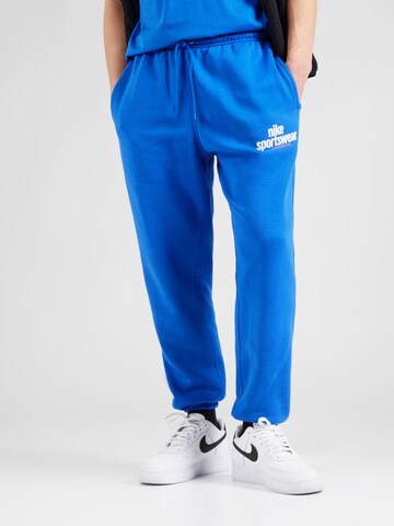 Tapered Pantaloni 'CLUB' di Nike Sportswear in blu: frontale