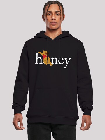 F4NT4STIC Sweatshirt 'Disney Winnie Puuh Der Bär Honig' in Zwart: voorkant