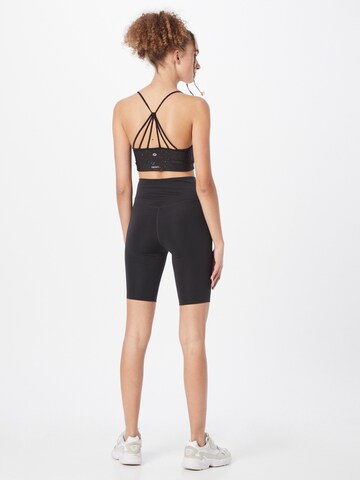 Girlfriend Collective Skinny Sporthose in Schwarz