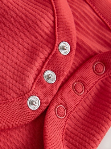 Next - Pijama entero/body en rojo