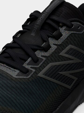 Chaussure de course 'Rebel Trail' new balance en noir