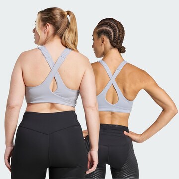 Bustino Reggiseno sportivo 'FastImpact Luxe' di ADIDAS PERFORMANCE in grigio