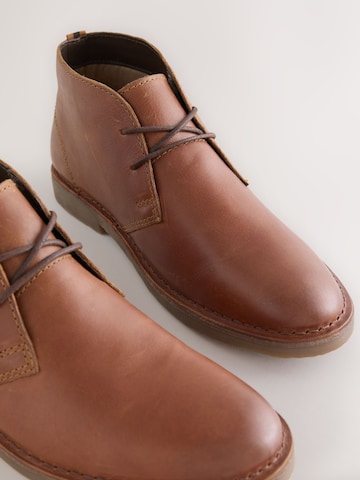 Next - Botines chukka en marrón