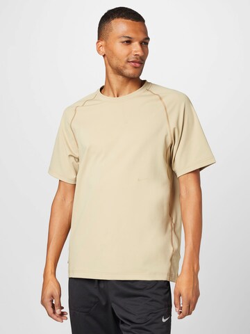 T-Shirt fonctionnel 'Axis' NIKE en beige : devant