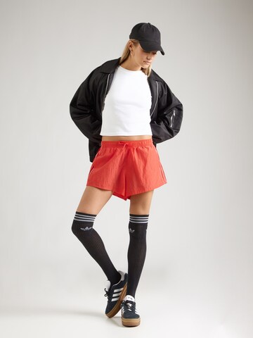 ADIDAS ORIGINALS Loose fit Trousers 'SANTIAGO' in Red