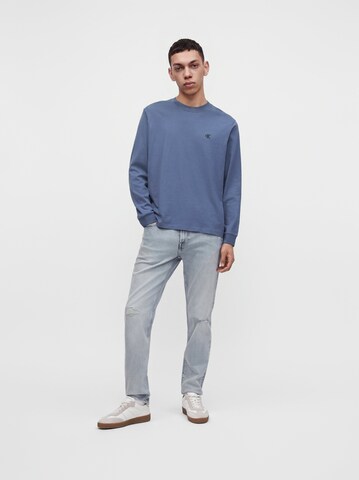 Tricou de la Calvin Klein Jeans pe albastru: față