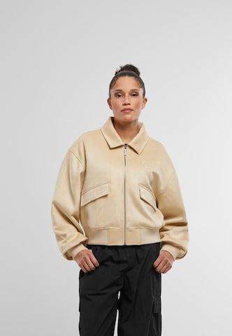 Veste mi-saison 'Os' Karl Kani en beige : devant