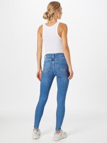 River Island Skinny Jeans 'CARRERO' in Blau