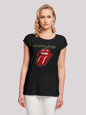 F4NT4STIC Shirt 'The Rolling Stones Plastered Tongue Washed' in Zwart: voorkant