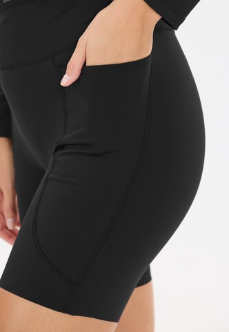 Athlecia Slimfit Sportbroek 'Aliya V2' in Zwart