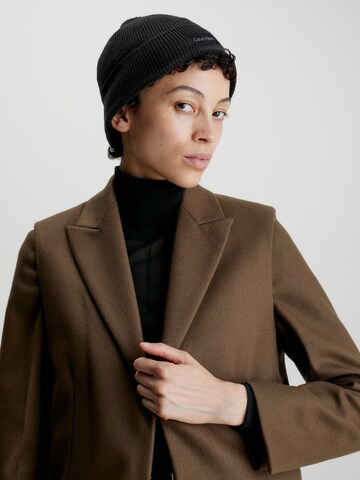 juoda Calvin Klein Megzta kepurė: priekis