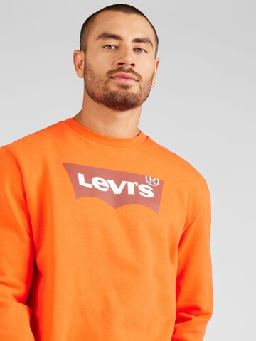 LEVI'S ® Sweatshirt 'Standard Graphic Crew' in Orange