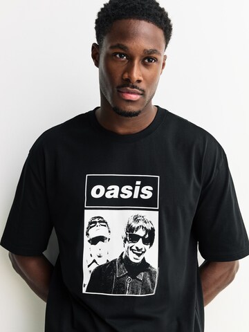 Next Paita 'Oasis' värissä musta