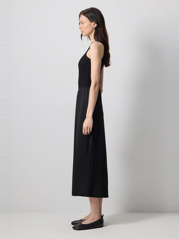 Touche Prive Skirt in Black